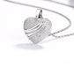Kette „Herzfunken“ – Herzanhänger mit Pavé-Funkeln & glänzenden Wellen – Silber