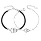 Partner-Set „Versprechen“ – Silberarmband für Frauen & schwarzes Herrenarmband mit Gravur-Charm