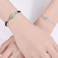Partner-Set „Versprechen“ – Silberarmband für Frauen & schwarzes Herrenarmband mit Gravur-Charm